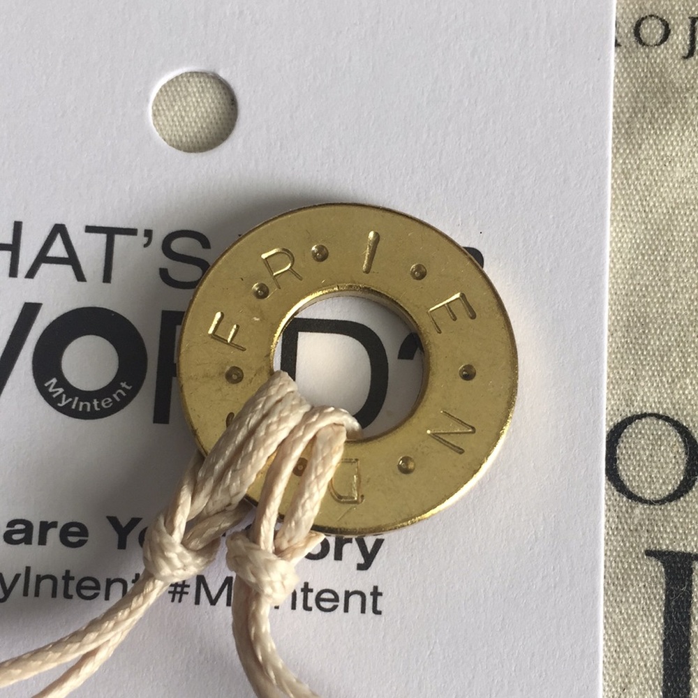 F.R.I.E.N.D.S. Gold charm on cream cord bracelet